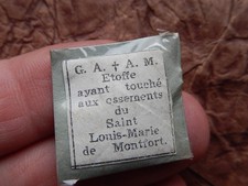 RELIQUE ETOFFE AYANT TOUCHE