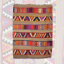 Tapis vintage fait main dans