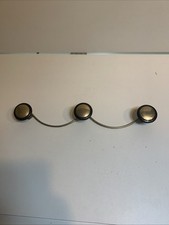 vintage coat rack gold and black 