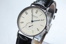 [ avec papier ] Montre NOMOS