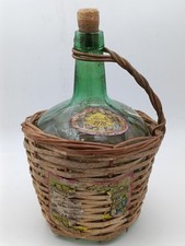 Ancienne dame-jeanne VIRESA 1976 en verre vert et osier – déco vintage campagne