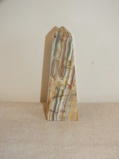 Veined marble obelisk, hard stone. Paper Press, Desk