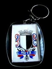 Ancien Porte Cle publicité magasin vêtement Homme ville de Paris blason Metz