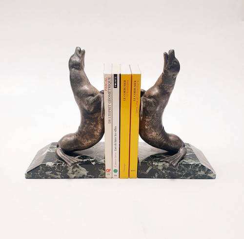 Serre livres sculpture otaries - sculpture,