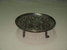 19th century silver metal flat heater.