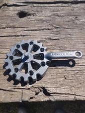 Grille de fond pivotante pour