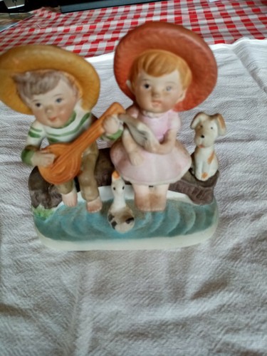 Figurine biscuit ceramique - en,