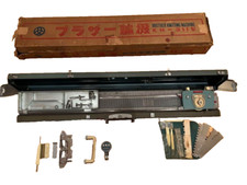 Machine à tricoter Brother