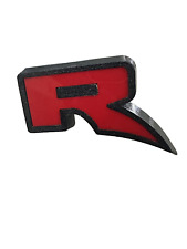 "R" logo on the front grille of the FORD Next-gen Ranger Raptor (2022-Present)