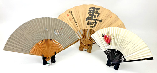 Trois ventilateurs pliants