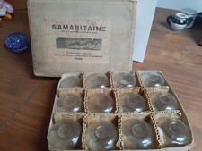 12 old suction cups in box La Samaritaine