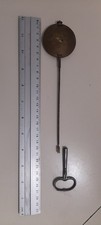 Balancier de Pendule Horloge et sa clé numéro 6