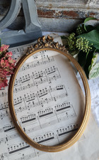 ANCIEN CADRE OVALE EN BOIS ET STUC DECOR DE ROSES ET NOEUD