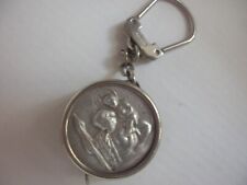 rare keychain Saint Christopher meter reel