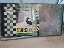 SCALEXTRIC. REF 32. ELECTRIC CIRCUIT CARS.  IN BOX