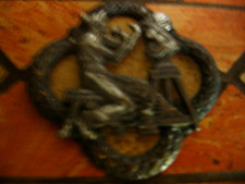 fibule grecque et médaille romaine