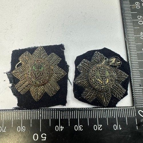 Insignes col laine - de,