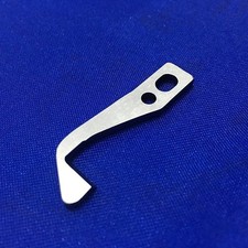 Couteau supérieur surjeteuse