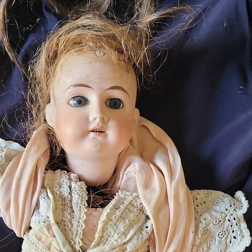 Poupée ancienne tête
