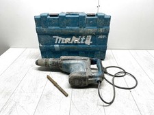 Marteau perforateur puissant Makita HM 1213C avec système antivibratoire AVT