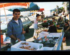 LOCQUIREC (29) FISH MERCHANT STAND at the market in 1988