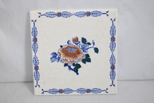 Ancien carreau en faïence de