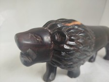 statue lion  bois ébene style