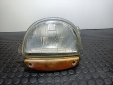 7700820021 phare gauche