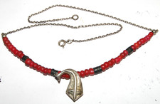 collier vintage avec poisson