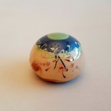 Presse papier boule en terre