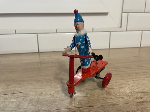 Clown sur trottinette - clown,
