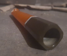 An Antique Amber Cigarette Holder and Composition
