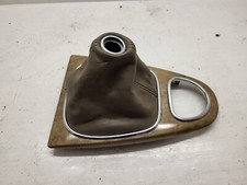 Cache et soufflet pour levier