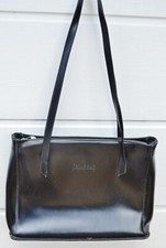 Sac porté épaule →