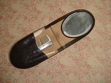 Small toilet kit with mustache comb, nail polish, file