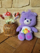 PELUCHE BISOUNOURS MAUVE