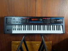 Roland Juno-Di Portable 61-key Mobile Synthesizer w/ bag power supply
