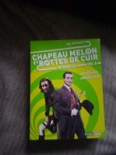 Chapeau melon et botte de cuir