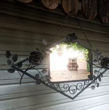 Important miroir mural en fer