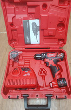 Milwaukee M12 BPD-202X Perceuse-visseuse à percussion rechargeable 12 V 2,0...