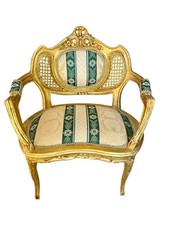 Fauteuil doré style Louis XV