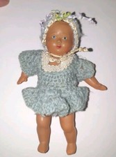 Antique doll: old doll converted old celluloid with its outfit