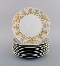 Bjørn Wiinblad pour Rosenthal. 10 assiettes en porcelaine à décor doré. 1980s