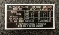 Autocollant de pression de