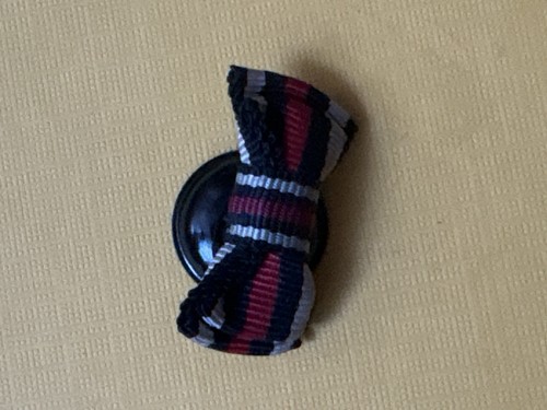 Boutonnière médaille - de,