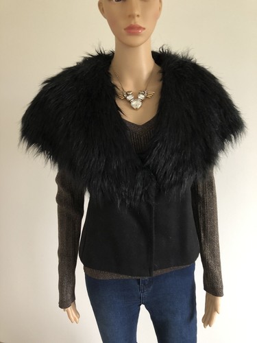 Veste noire sans - manches, avec