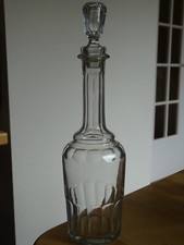 AN OLD WINE DECANTER SHAPED BOTTLE BLOW MOUTH FLAT SIDES