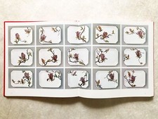 Livre sur la table basse en céramique orientale, art asiatique moderne en...