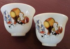 Vintage PAIR of Porcelain SAKE CUPS with Asian Figures, Drum & Lantern