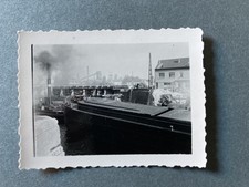 photo barge passing bridge destroyed Brussels Belgium 1940